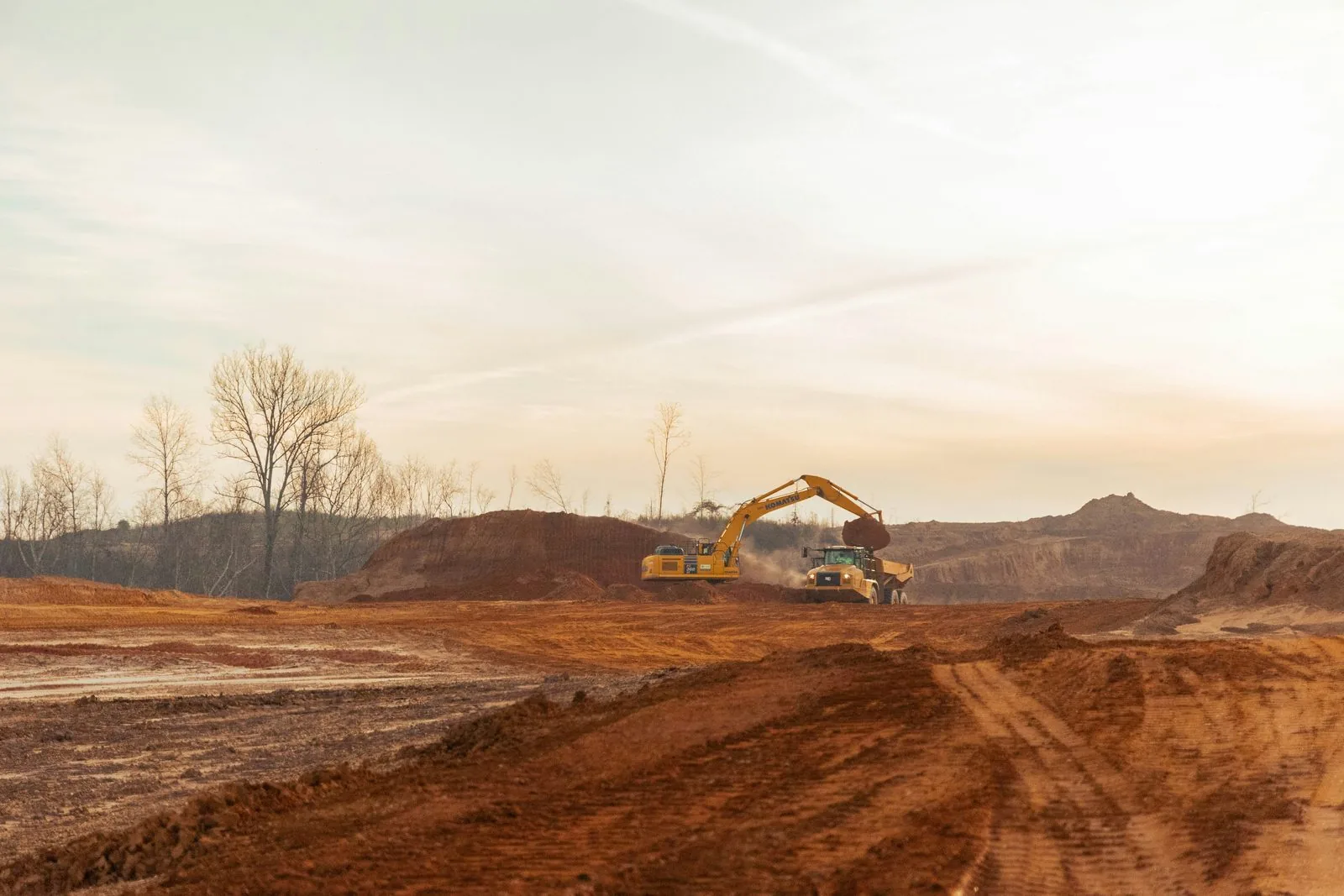 Earthmoving equipment working at a large construction site
